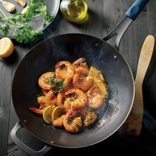 Sartén para wok Tramontina de acero al carbono de 12,5" acabado en aceite natural con agarre extraíble