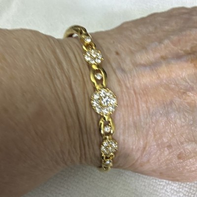 Avon Gold Tone Tennis Bracelet has Round White Crystal Snap Closure 001
