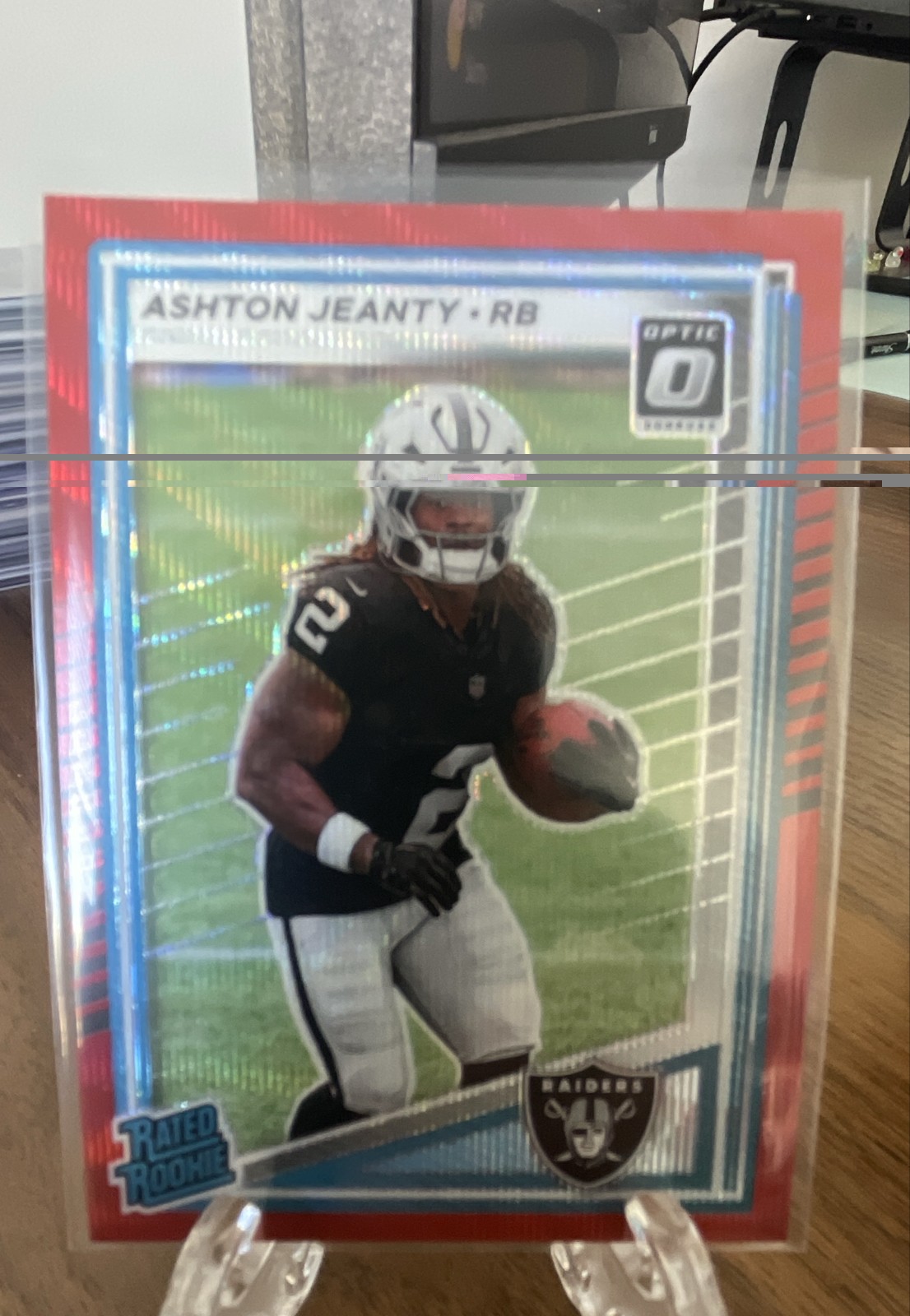 2025 Panini Donruss - Rated Rookie Ashton Jeanty Optic Preview Red Wave Prizm RC