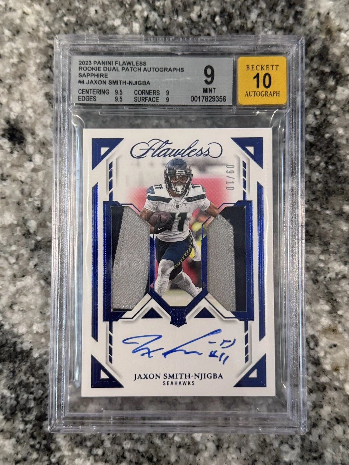 Jaxon Smith-Njigba Panini Flawless Rookie Dual Patch Autographs #DPAJSN Sapphire