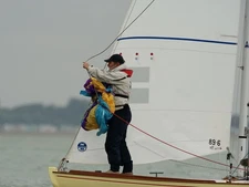 Photo A3 Cowes Week 2014 Attaching the spinnaker. Shortly after the star c2014