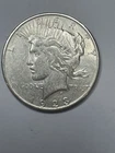 1922 silver peace dollar, ONE DAY SHIPPING.  Capsule included.  A very nice coin