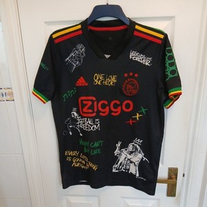 Divisa Di Calcio Ajax Amsterdam Bob Marley Special Prima Nero 2025 2026 20638