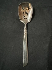 SOUTH SEAS Community Slotted Jelly Spoon Silver Plate Ornate Pierced