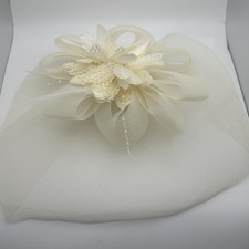 Elegant Ivory Bridal Fascinator with Floral and Netting Detail