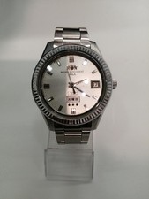 WEEKLY AUTO ORIENT Day-Date Automatic Wristwatch