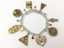 Fantastic Beasts THE CRIMES OF GRINDLEWALD Movie Themed 8 Charm BRACELET