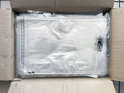 Lot de 50 sachets plastique transparent à fermeture adhésive 23 x 32 cm - Photo 1/2