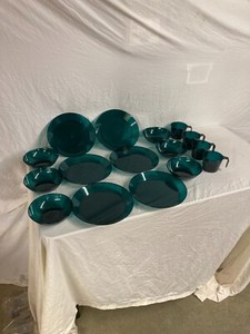 Translucent green plastic camping dishes
