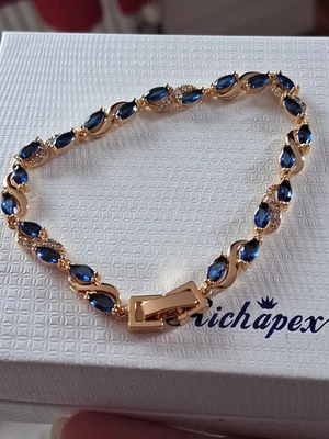 18ct gold plated tennis bracelet clear blue cubic zirconia stones boxed Richapex - Image 1 of 4