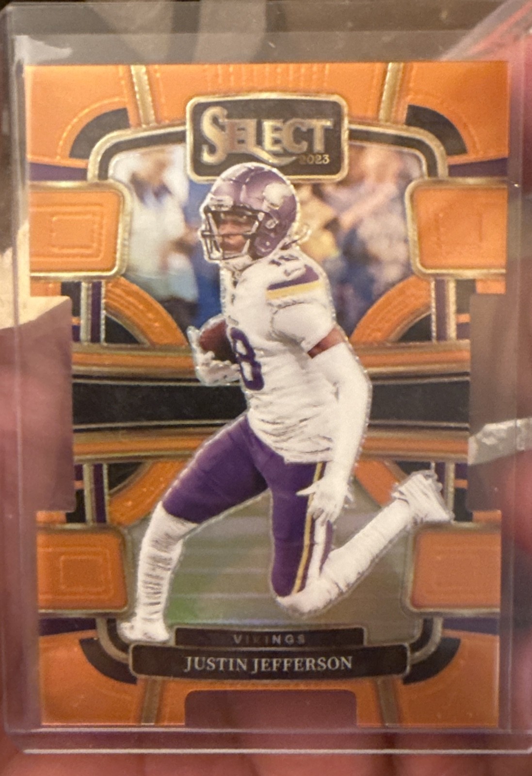2023 Panini Select - Concourse Justin Jefferson #65 Orange Prizm Die-Cut /499