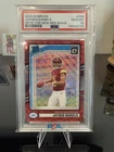 2024 Panini Optic Rated Rookie Jayden Daniels #389 Red Wave Prizm RC PSA 10