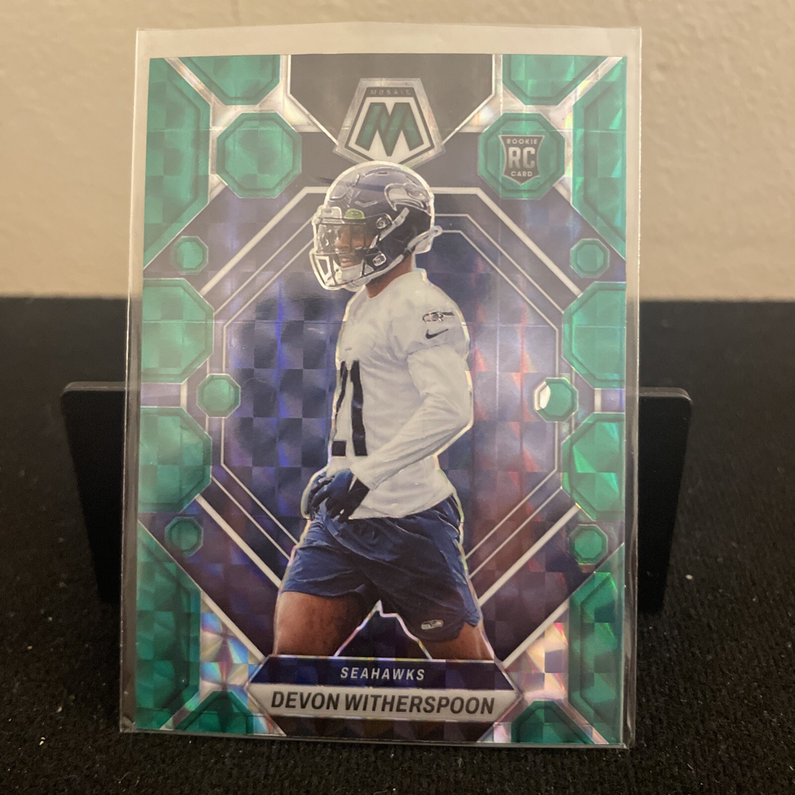 2023 Panini Mosaic - Rookies Green Mosaic Prizm #313 Devon Witherspoon (RC)