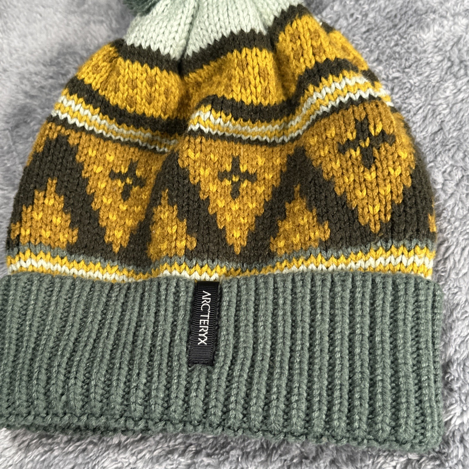 Cappello Arc'teryx unisex Fernie Toque in maglia con pom in misto lana Sundance OS