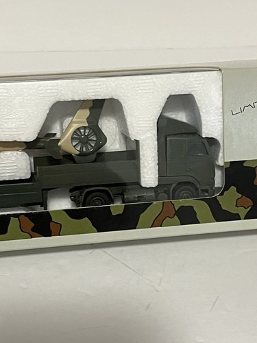 NEW RARE ROCO 867 VOLVO ARMY SEMI FLAT TRUCK TRAILER WITH CAMO EUROCOPTER EC635 - Picture 4 of 6