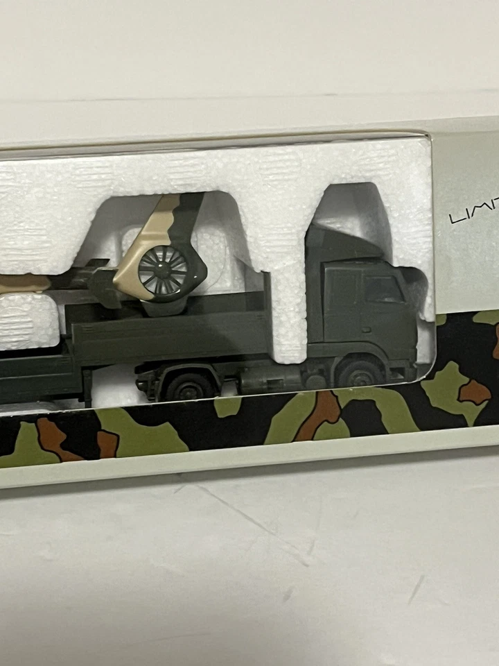 Remolque camión semiplano Roco 867 Volvo Army nuevo raro con camuflaje Eurocopter EC635 Foto 4 de 4