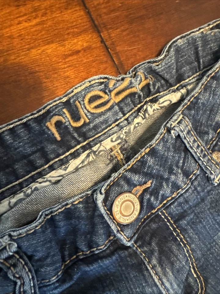 Pantalones de mezclilla Rue21 para niñas talla 12 tiro bajo ajustados corte bota azul elástico mezcla de algodón Foto 2 de 4