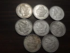 8) Eight Morgan 1882, 83,  90, 81, 1900, 83, 86, 81 (AU-XF) SILVER DOLLARS