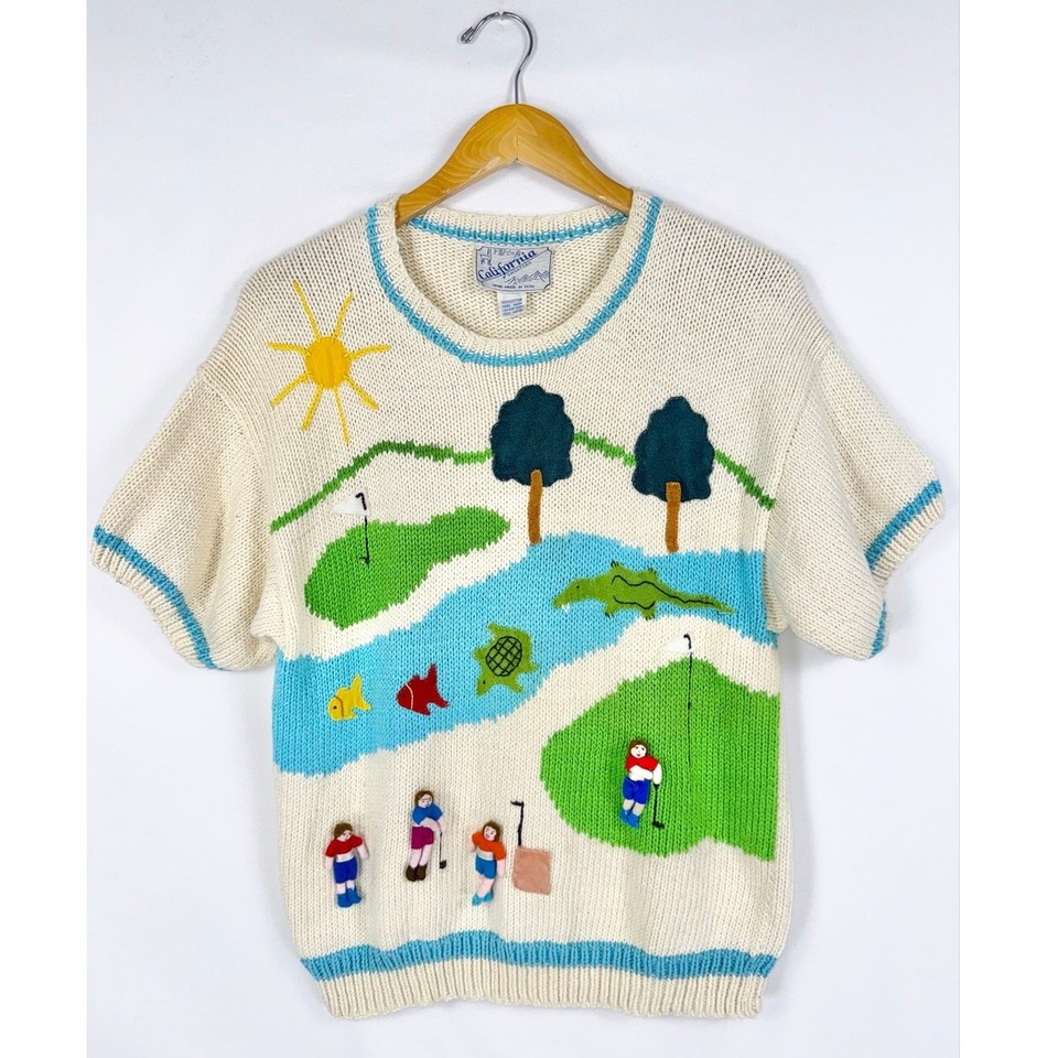 Cream hand-knit California novelty sweater with genuine vintage character — the kind of find thrift hunters dream about.