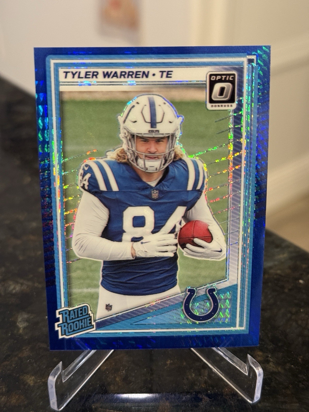 2025 Panini Donruss Optic - Rated Rookie Tyler Warren #234 Blue Hyper Prizm (RC)