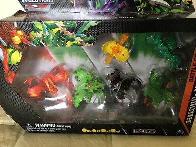 Bakugan Evolutions Dragonoid And Sluggler Battle Strike Paquete De 6 Figuras De Accion 9 Cartas Intercambiables 8 Bakucores Juguetes Para Ninos De 6