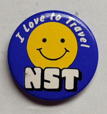 NST “I LOVE TO TRAVEL” BUTTON PIN BADGE - NST TRAVEL AGENTS ADVERTISING