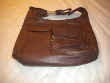 Brand New Leather   BAG BROWN color with many compartments AND LEATHER STRAP