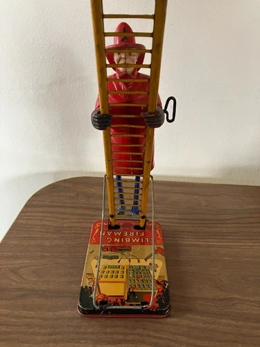 "Vintage Marx Climbing Fireman Wind- up Tin Toy-Works- 1950s Fire Rescue"