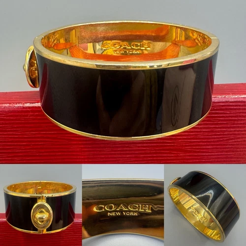 Bracciale classico COACH nero e oro con cerniera larga e chiusura laterale