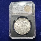 1883-CC Morgan Silver Dollar NGC MS64 Original Bag Fragment