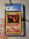 Pokémon TCG Charmander Unlimited Team Rocket CGC Mint 9