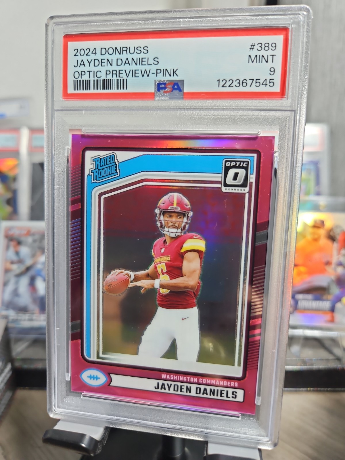 2024 Panini Donruss Jayden Daniels Rated Rookie RC Optic Preview Pink PSA 9 view 4
