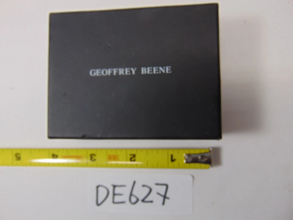 Gemelos Geoffrey Beene tono plateado y negro a rayas rojas y negras Foto 3 de 4