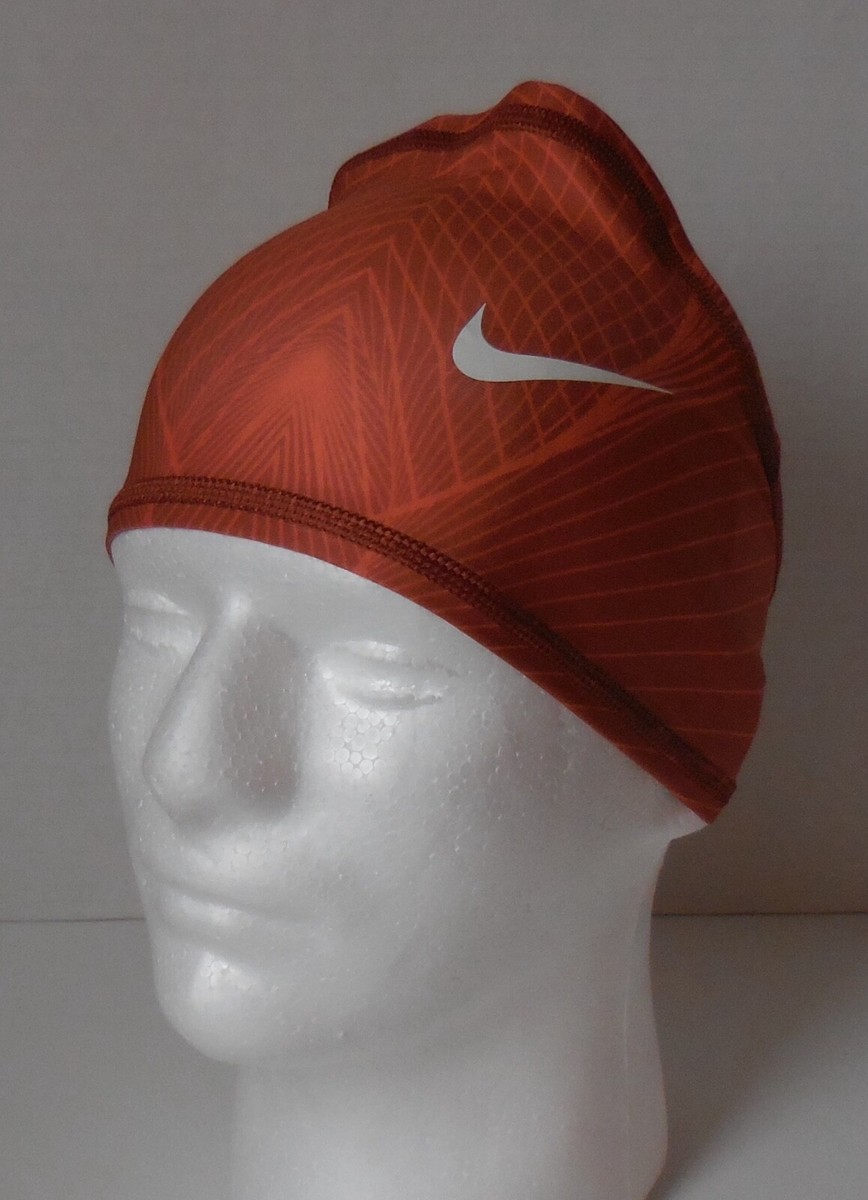 orange nike skull cap