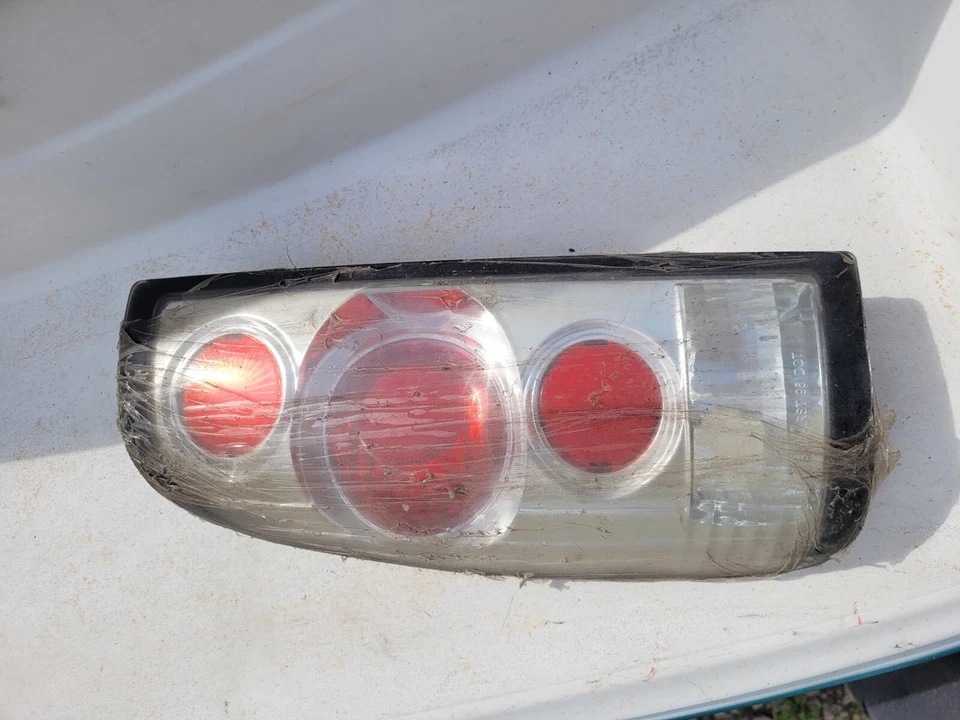 Luz trasera izquierda transparente APC 1997-2003 Ford F150 99-04 F250 F350 NOS Foto 2 de 4