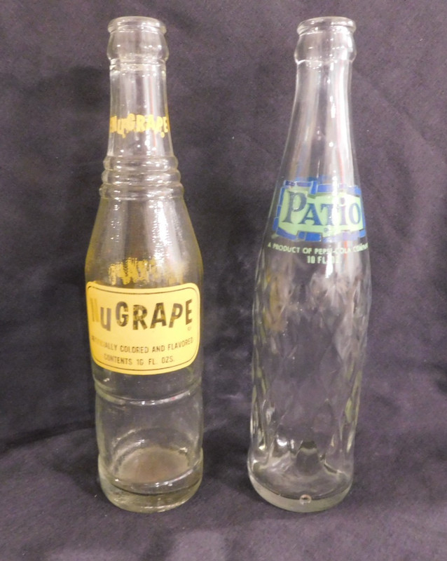 TWO VINTAGE SODA BOTTLES NUGRAPE 10 FL. OZ.  ATL, GEORGIA & PATIO 10 OZ.