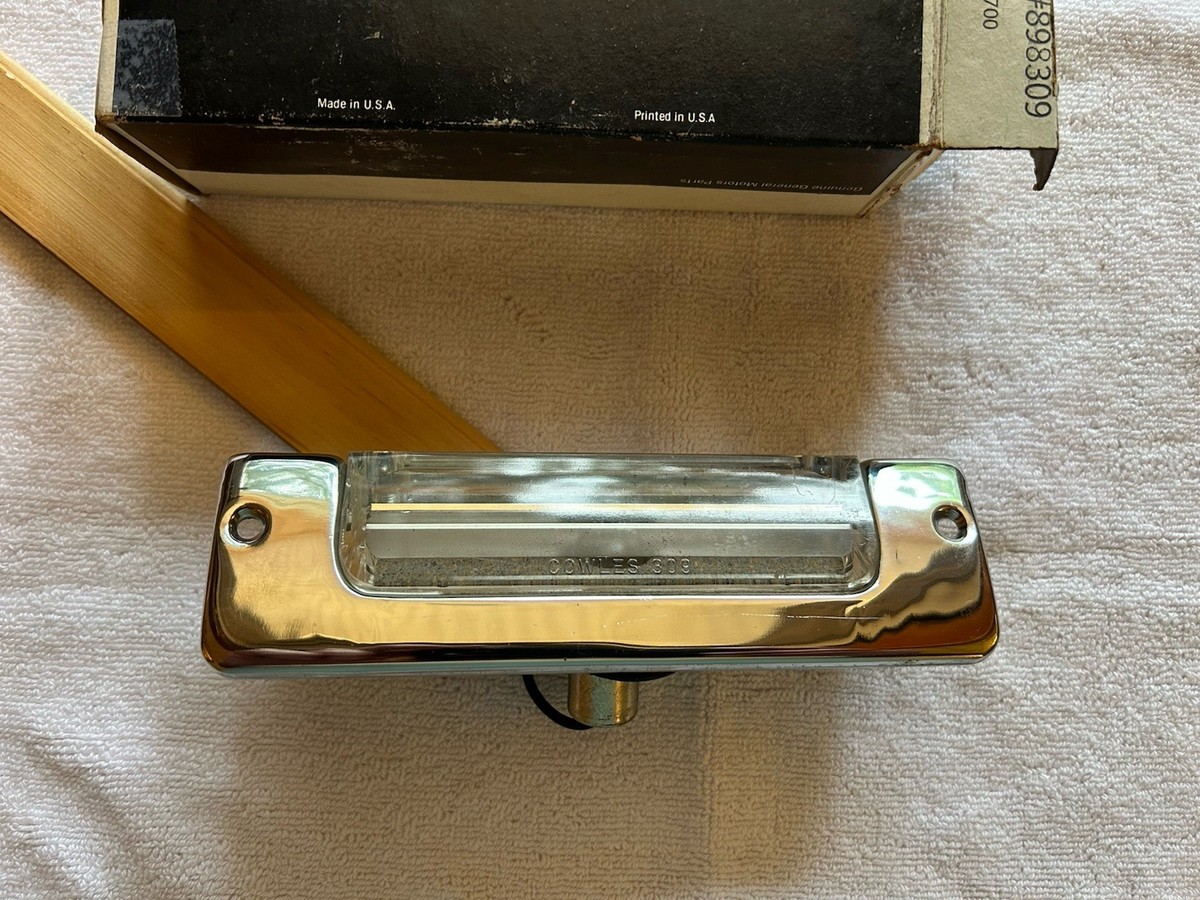 NOS GM Part 898309 1957 Chevrolet Belair 210 Rear License Plate