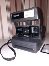 Vintage camera Poloroid 636 close-up instant photo