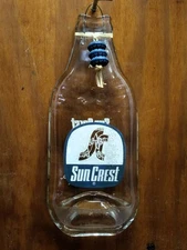 SUN CREST; ACL SODA BOTTLE; (FLATTEN); (Up-cycled); 10 OZ BOTTLE; ATLANTA, GA.