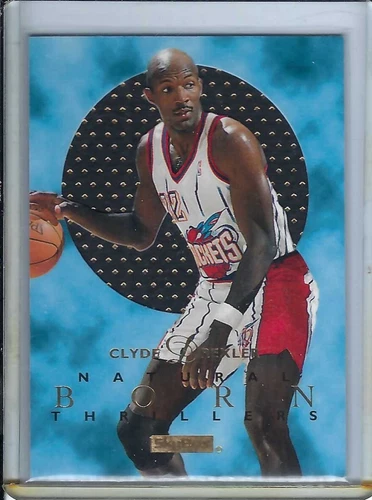 1995-96 Skybox E-XL Natural Born Thrillers #4 - Clyde Drexler