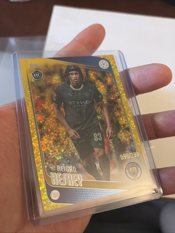 2025-26 Topps UEFA Reigan Heskey RC Gold Sparkle #/299 Manchester City #142