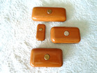 CIGARETTE/CHEROOT/TOBACCO CASE SET OF 4.1920S/30S.LIGHT WOOD.SILK LINING