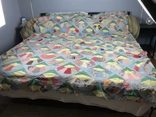 Handstitched antique quilt top feed sack material grandmother’s fan