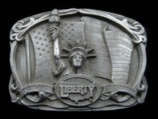 RL13115 VINTAGE 1986 LIBERTY THE FLAME OF FREEDOM COMMEMORATIVE BELT BUCKLE