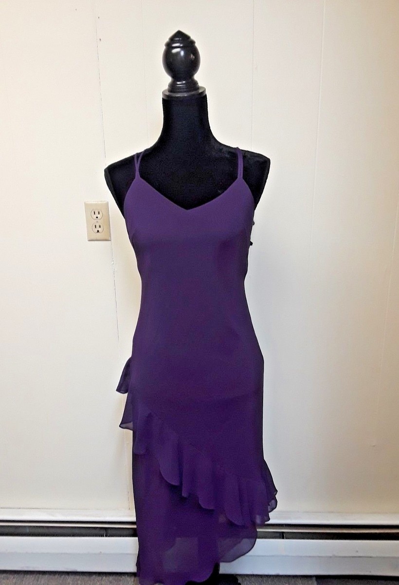 meghan purple dress Meghan Markle Steps Out in a Bold Purple Dress at the One Young World Summit