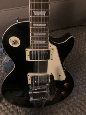 Epiphone Les Paul Standard.  black body electric guitar. Played 4 or 5 times.
