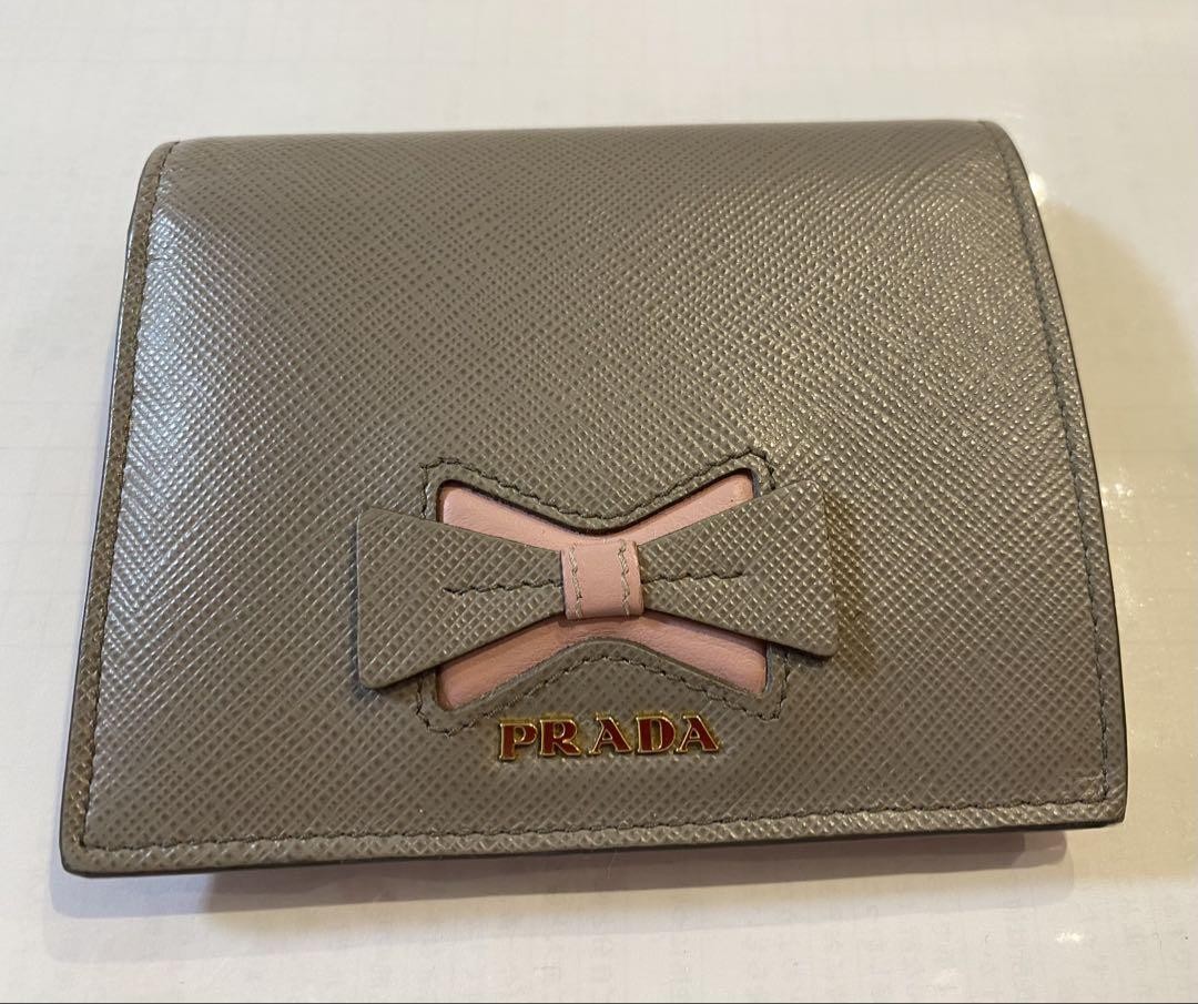 Prada compact wallet in stylish gray and pink hues