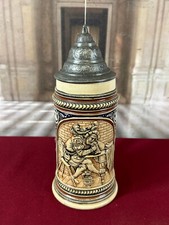 ANTICA BROCCA IN GRES CON MONTATURA IN PELTRO OLANDA BASSORILIEVO