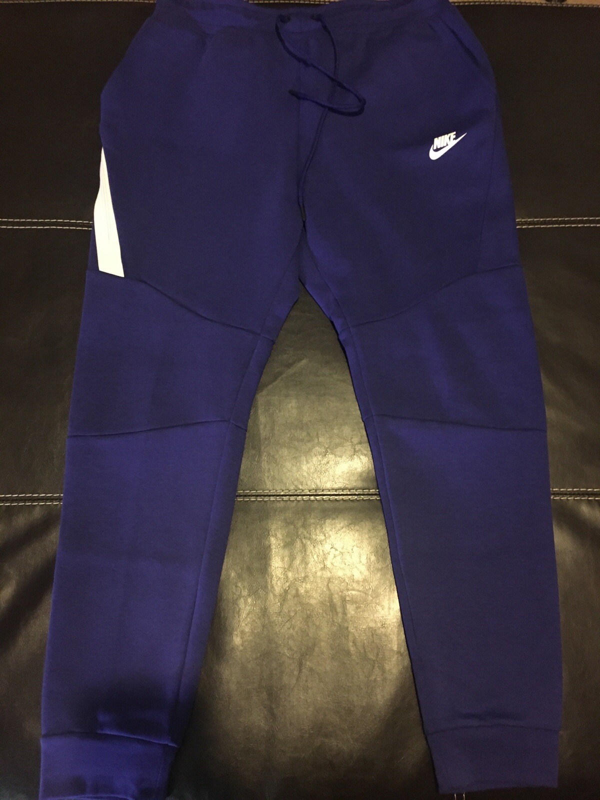 nike tech fleece pants purple
