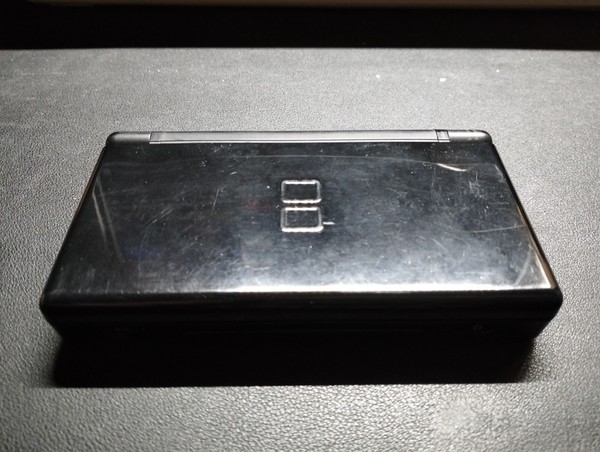 NDS Lite Black Refurbished. No charger, No stylus. With slot 2 cover